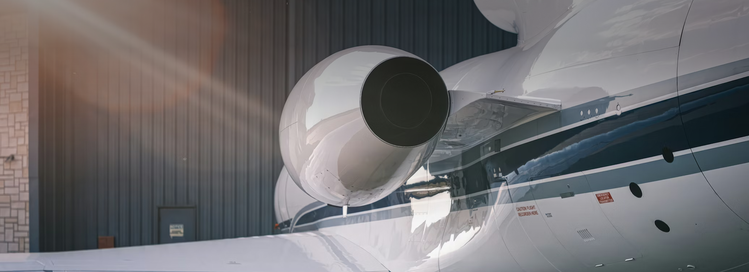 Close-up of a private jet engine at a hangar